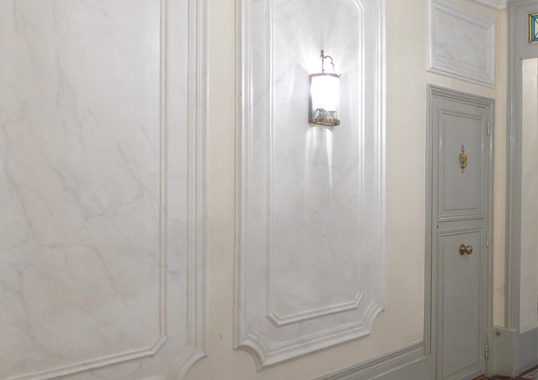 faux white veined marble entrance hall